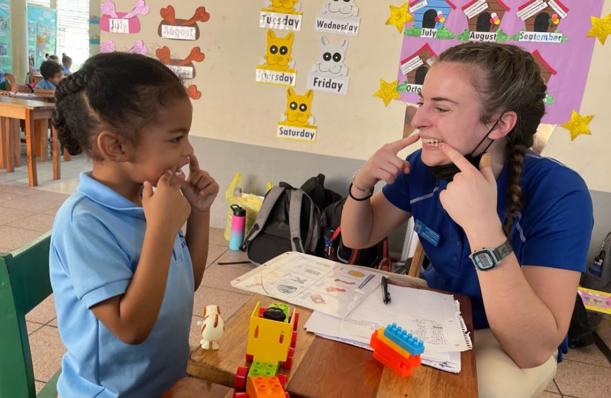 Misericordia University Speech-Language Pathology student working with a child