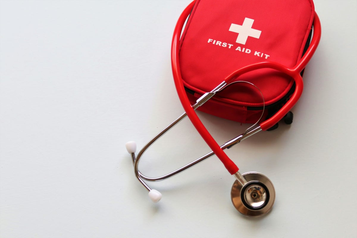 Photo of red first aid kit with stethoscope