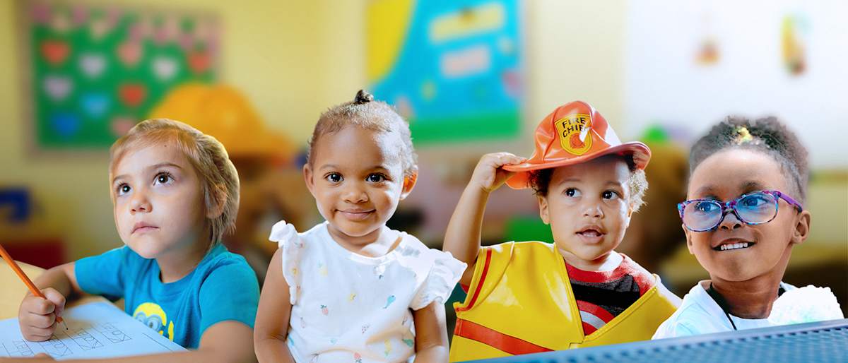 Children in field walking and learning.