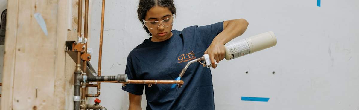 Plumbing student working