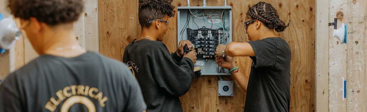 Electrical students working