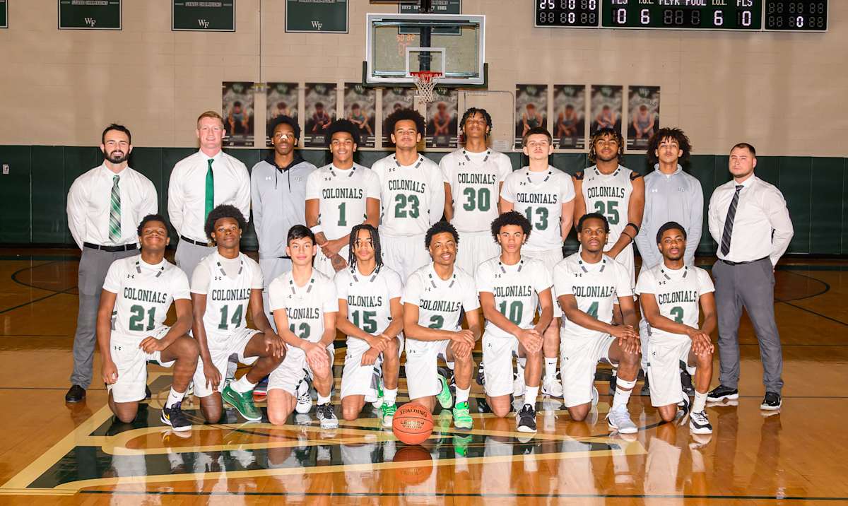 team photo of boys' varsity basketball team