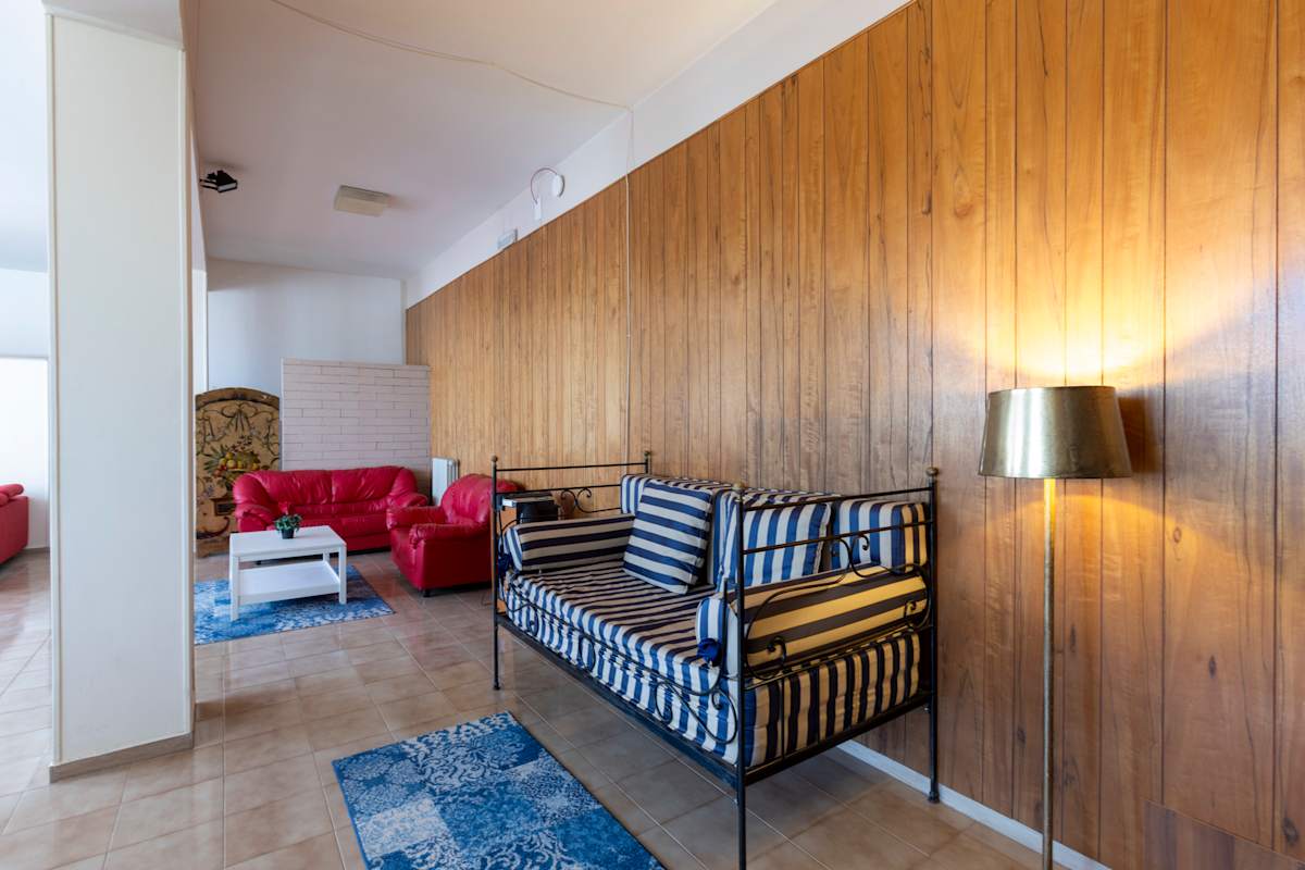 A bright common room inside Cuore residence