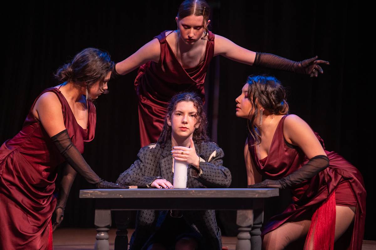 Students connecting in a theater scene