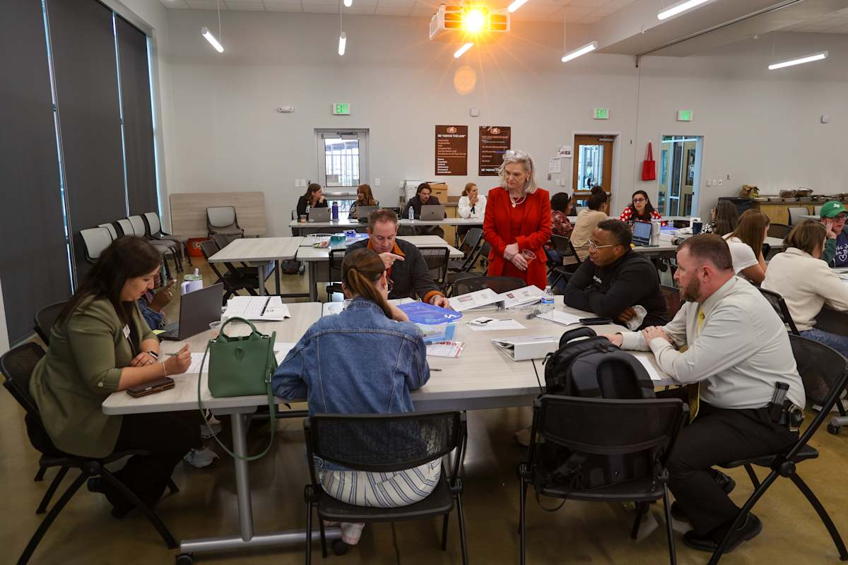 Long Range Facilities Planning Committee members work together during the April 7 meeting.