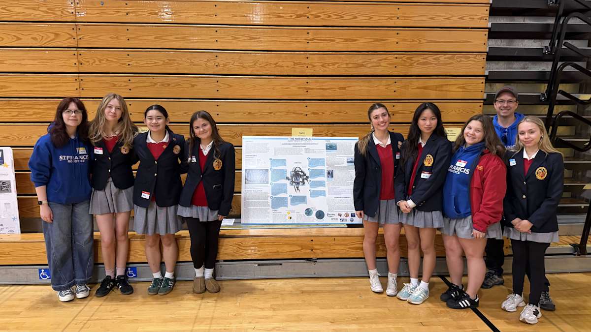 St. Francis Robotics team celebrating their win