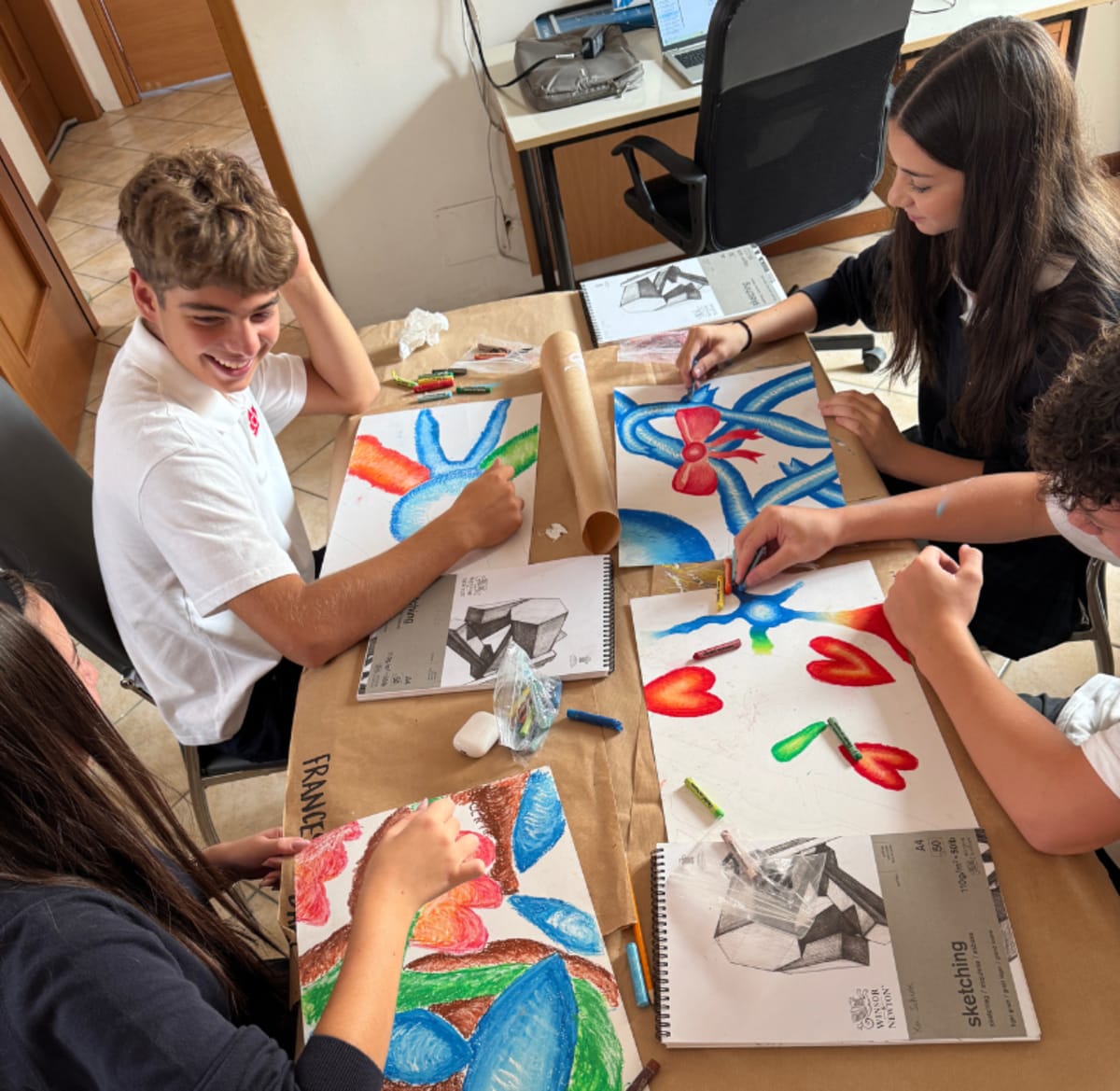 A CCI student working in an art class