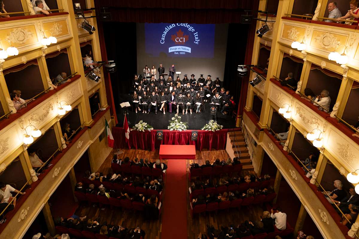 The CCI school community gathered on stage at Teatro Fenaroli