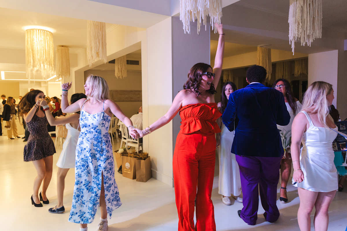 Friends celebrating together on the dance floor