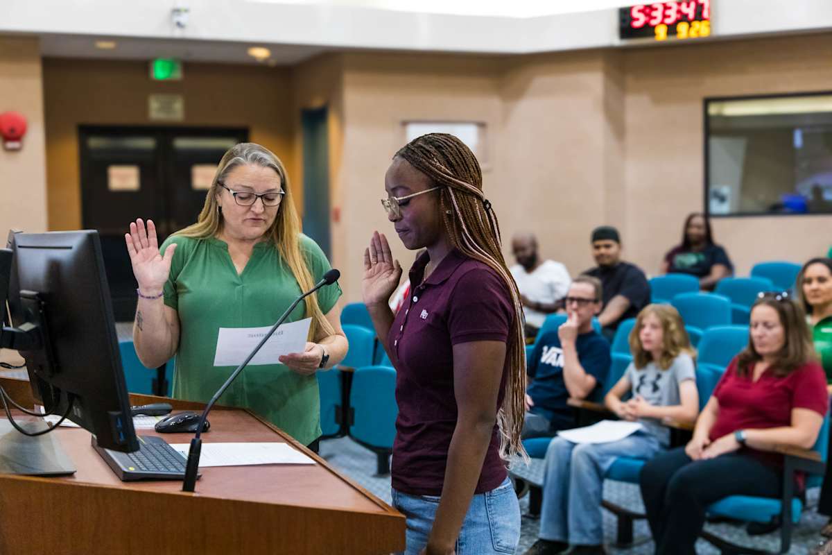Board President Shelly Ruiz administering the Oath of Office to Jordyn Jackson