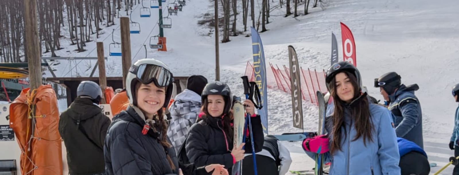 Three CCI students together on a winter ski day