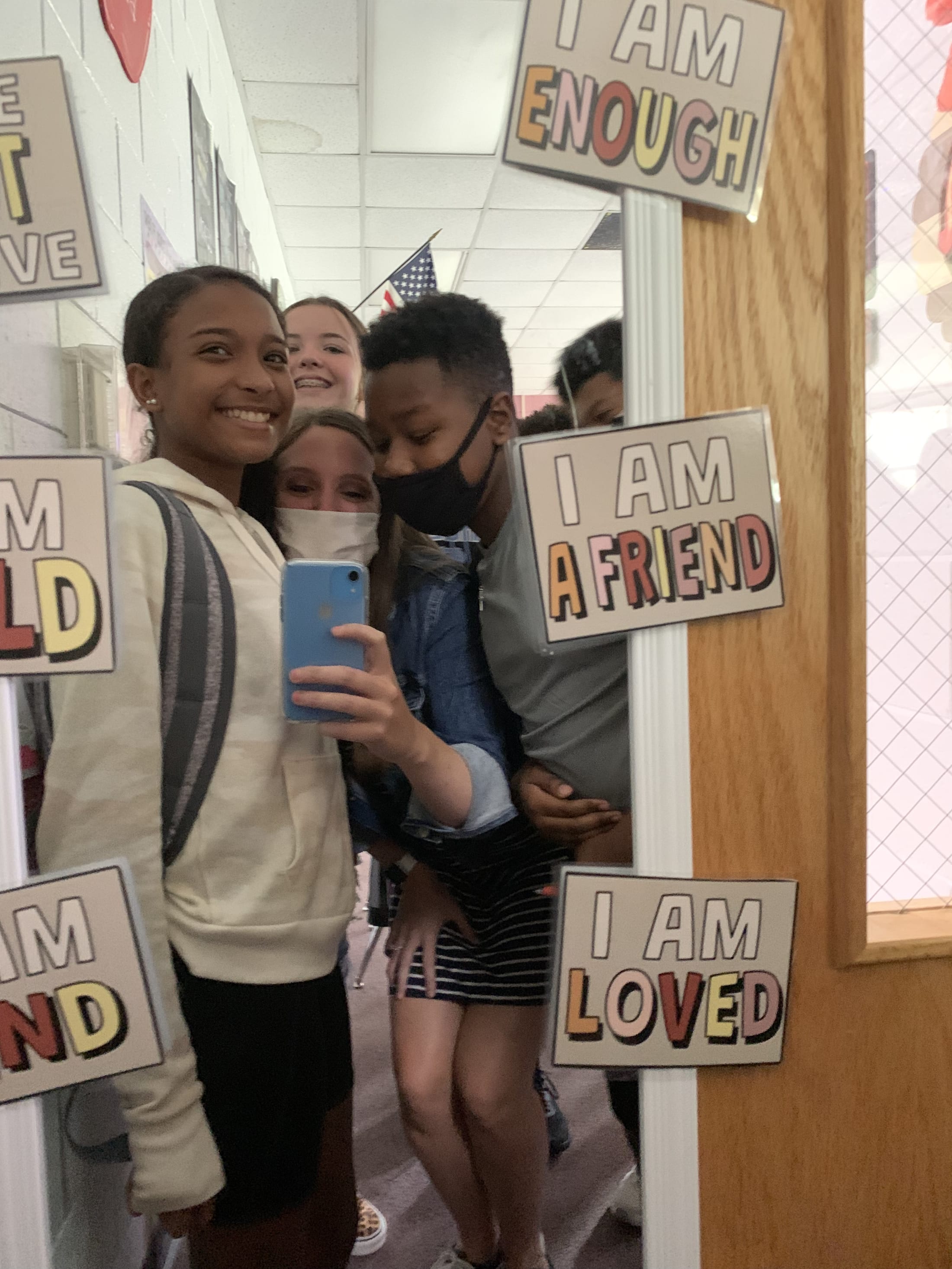 I Am Enough students in mirror
