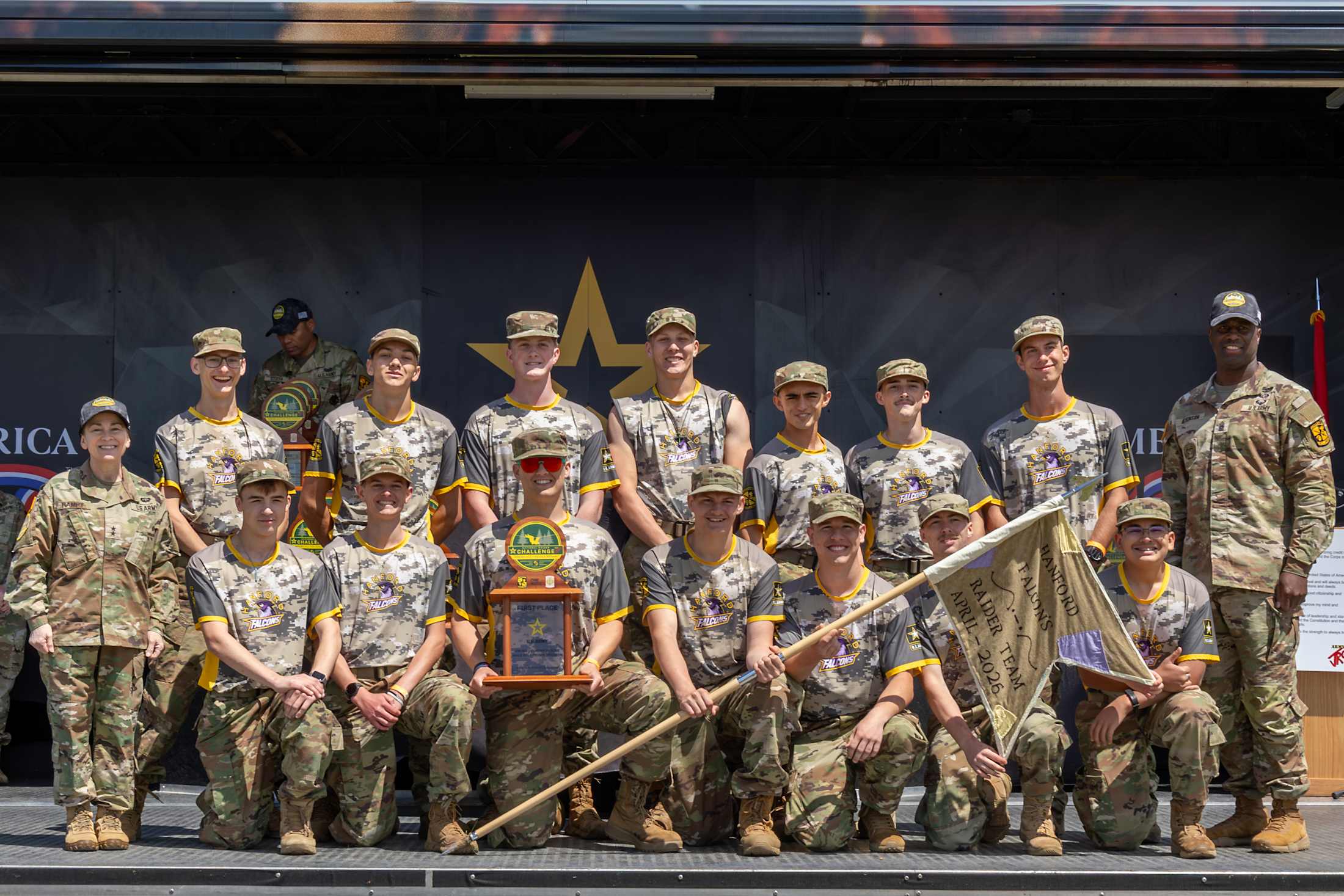Hanford JROTC Raider Team on stage with their first place trophy for Cross Country Rescue