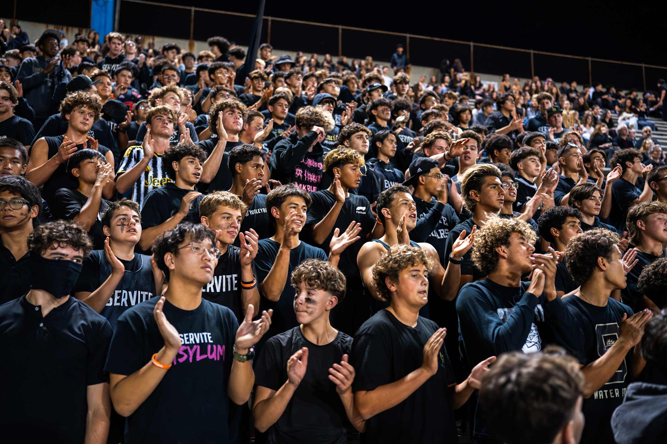 Servite students together