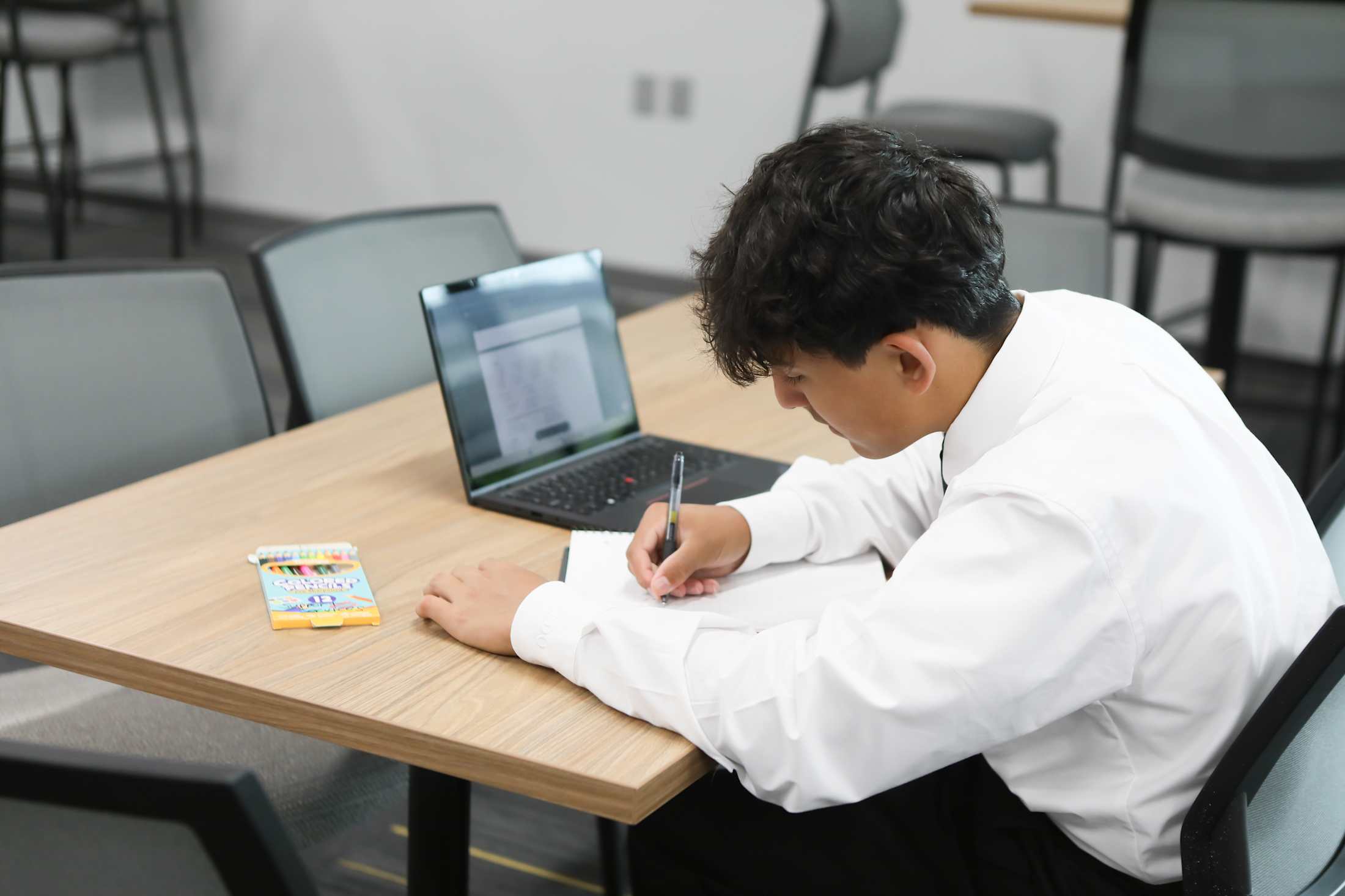 Servite student receiving individual academic support