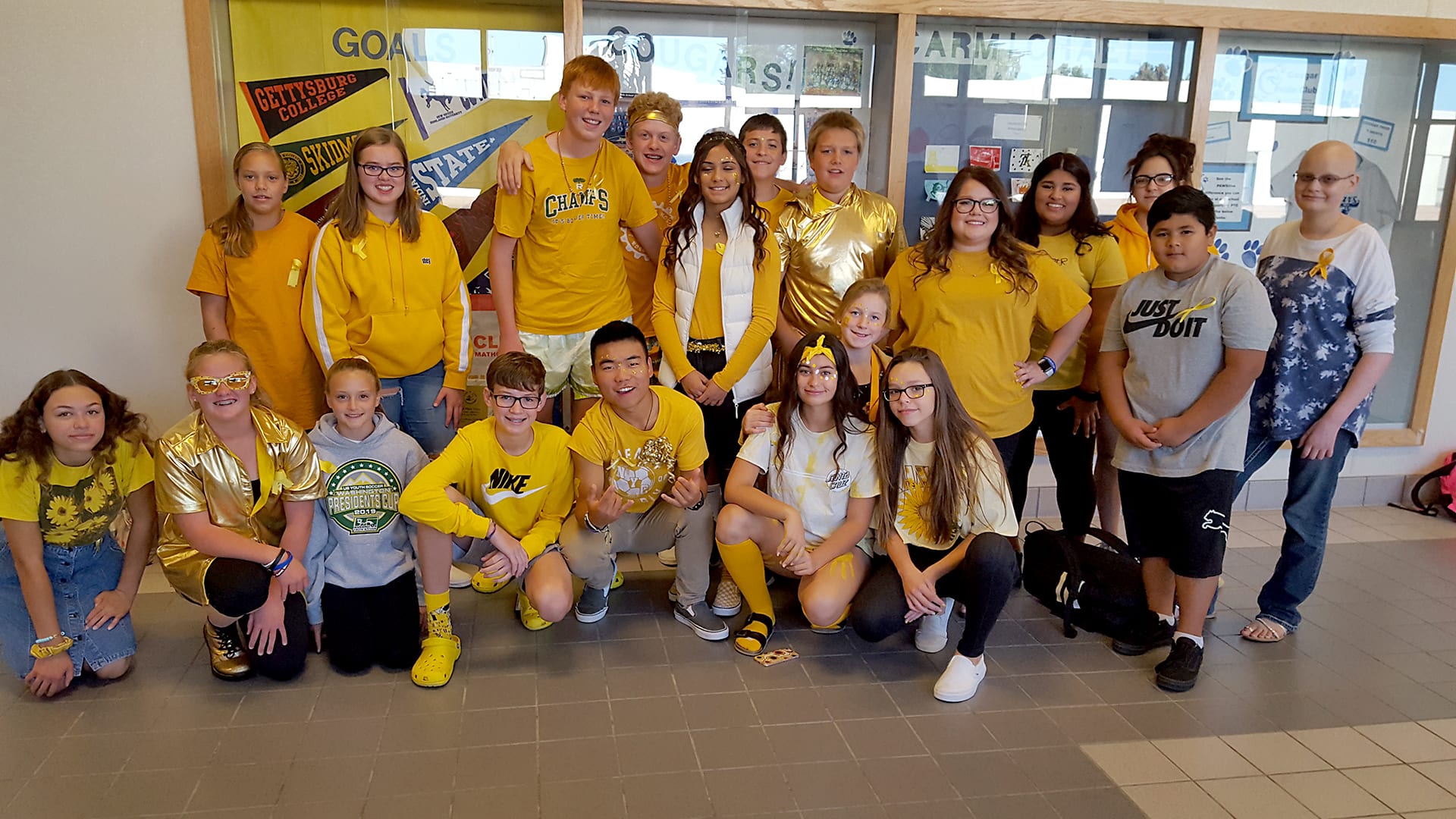 Carmichael students wore gold as part of a global cancer awareness campaign in honor of two students.