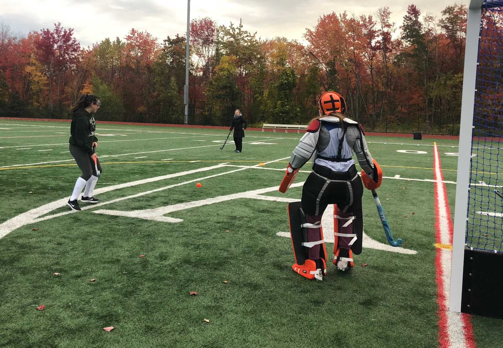 Girls Field Hockey team practice at Austin Prep Austin Prep girls field hockey team practicing on the field