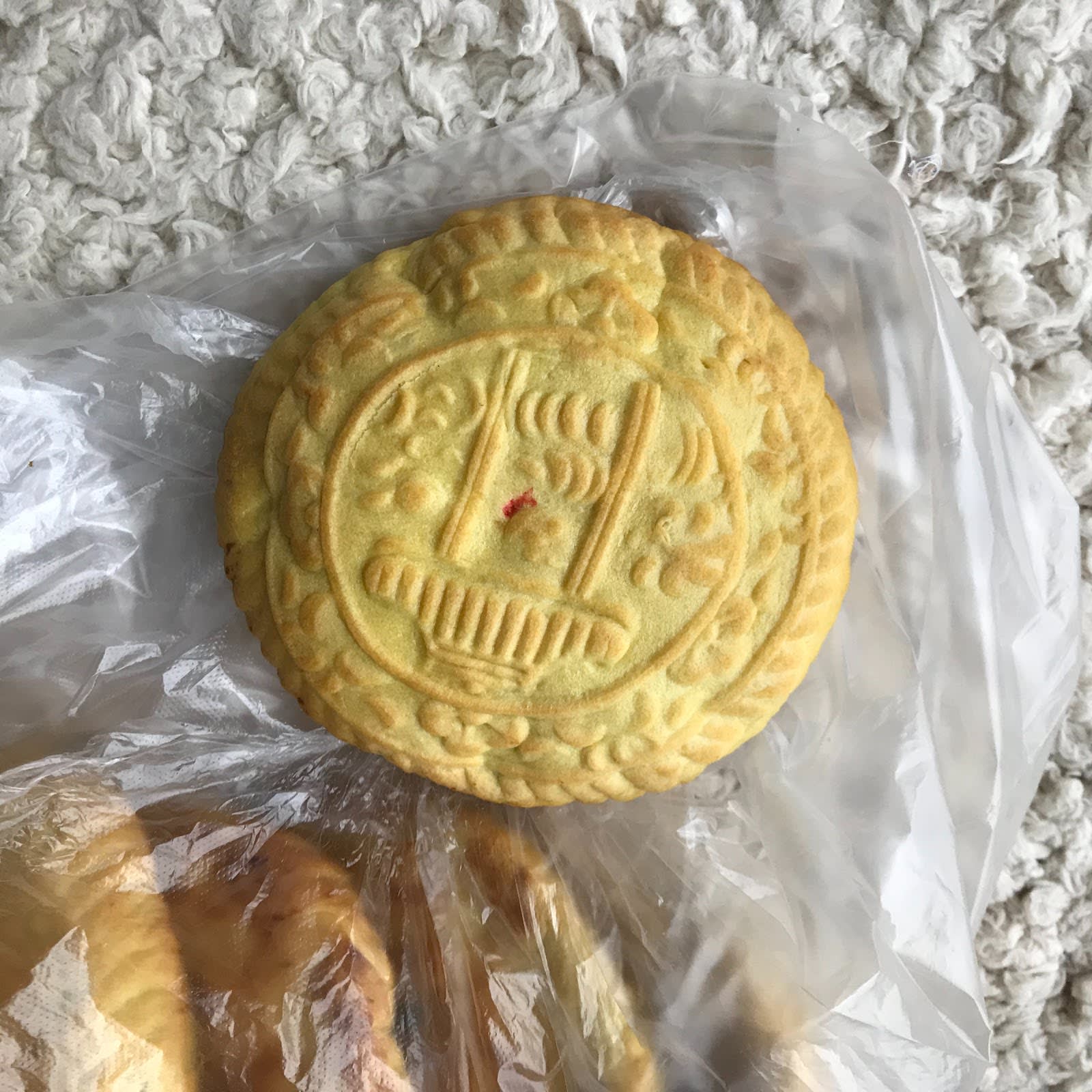 International student cultural presentation Traditional mooncake shared during Chinese Mid-Autumn Festival celebration