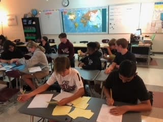 Students working collaboratively on a geography project