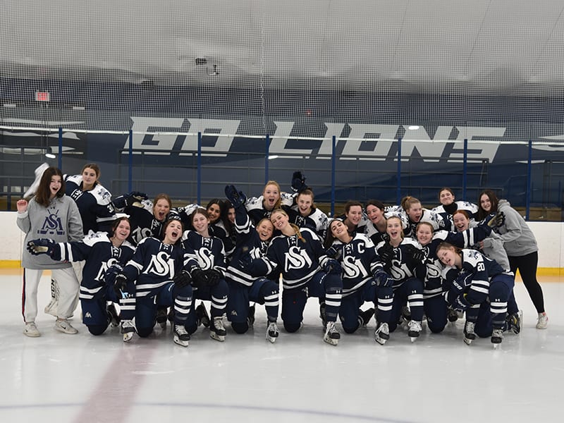 St. Mark's girls hockey places on the ice. 