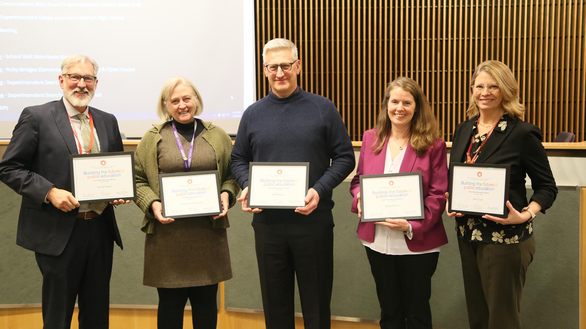 School Board members David Cogan, Jacqueline McGourty, Bob Swain, Sandy Hayes, and Amy Cast hold certificates for School Board Recognition Month