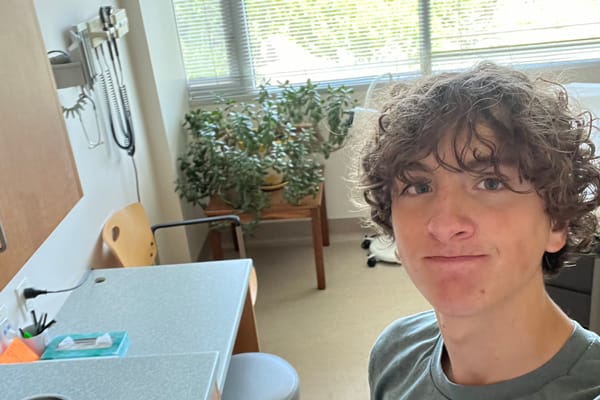 Diego Ize-Cedillo, Rowland Hall class of 2024, takes a selfie at his internship at People's Health Clinic.