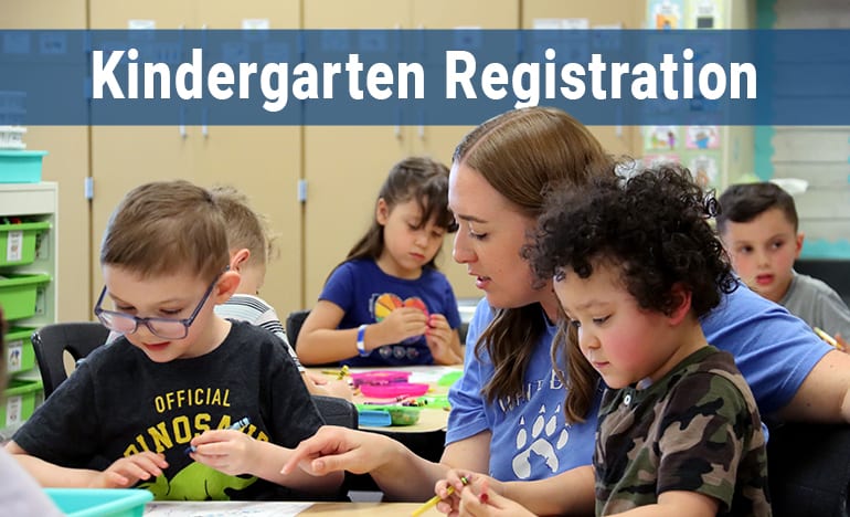 A mother helps her son prepare for his first day of kindergarten at Marcus Whitman Elementary