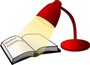 lamp shining on book 