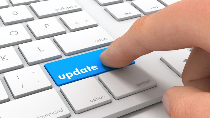 A keyboard with a blue Update button