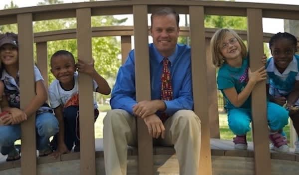 Tim Barrier with Stanley students during the early years of Stanley Middle School