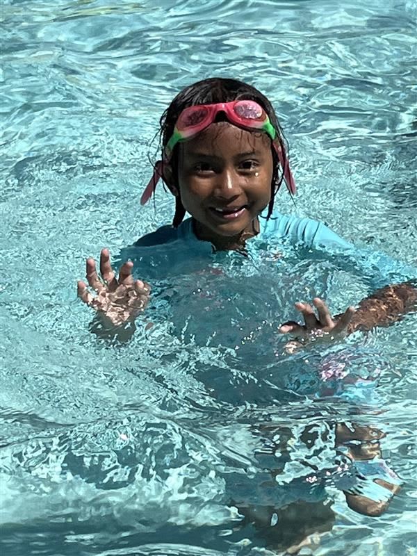 Child swimming during Summer at Stanley