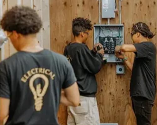 Electrical apprentice working on wiring