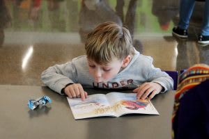 Student reading a book