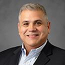 Photo of principal of Dr. Joaquín García High School