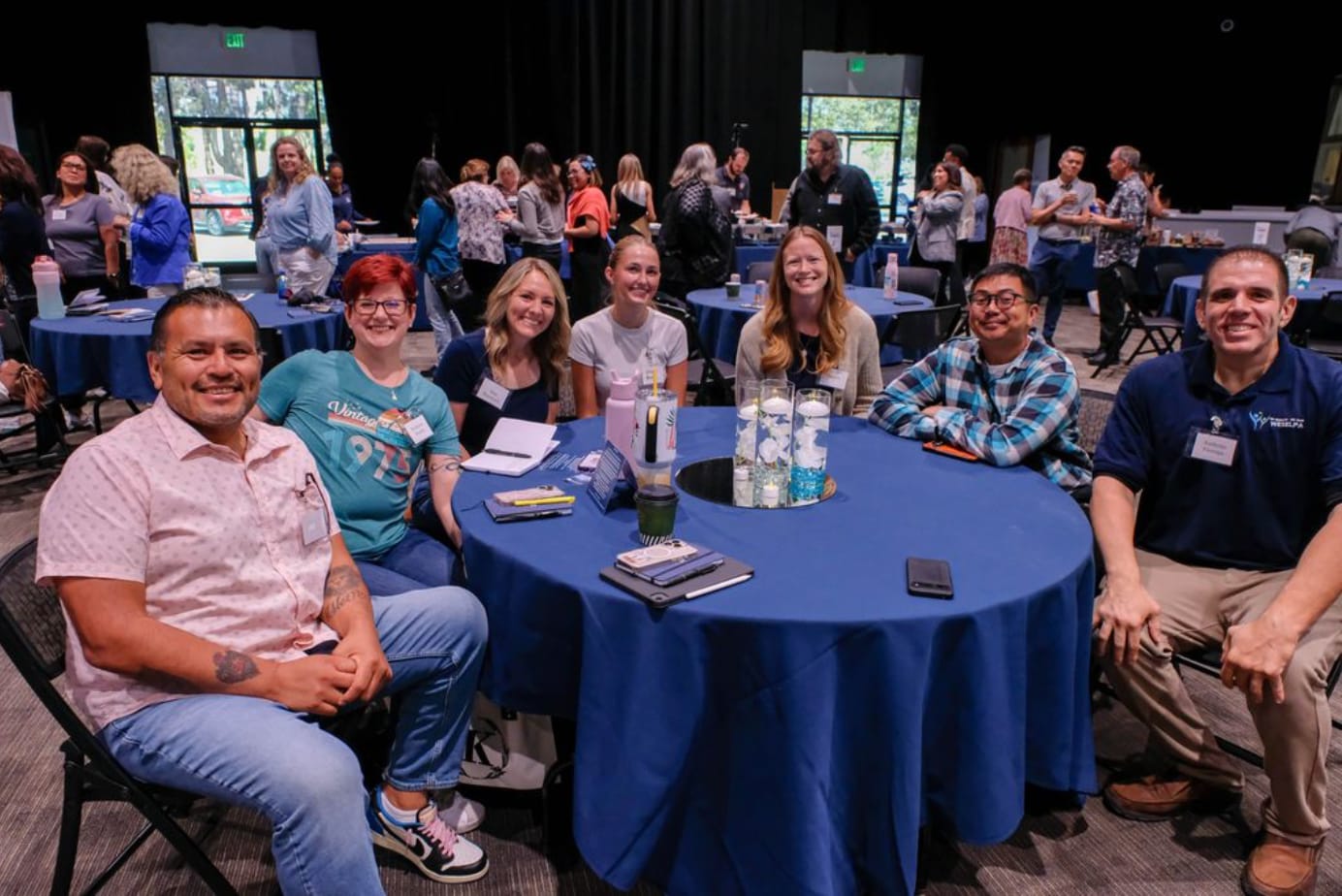 Disability Symposium 2025 Table with Attendees