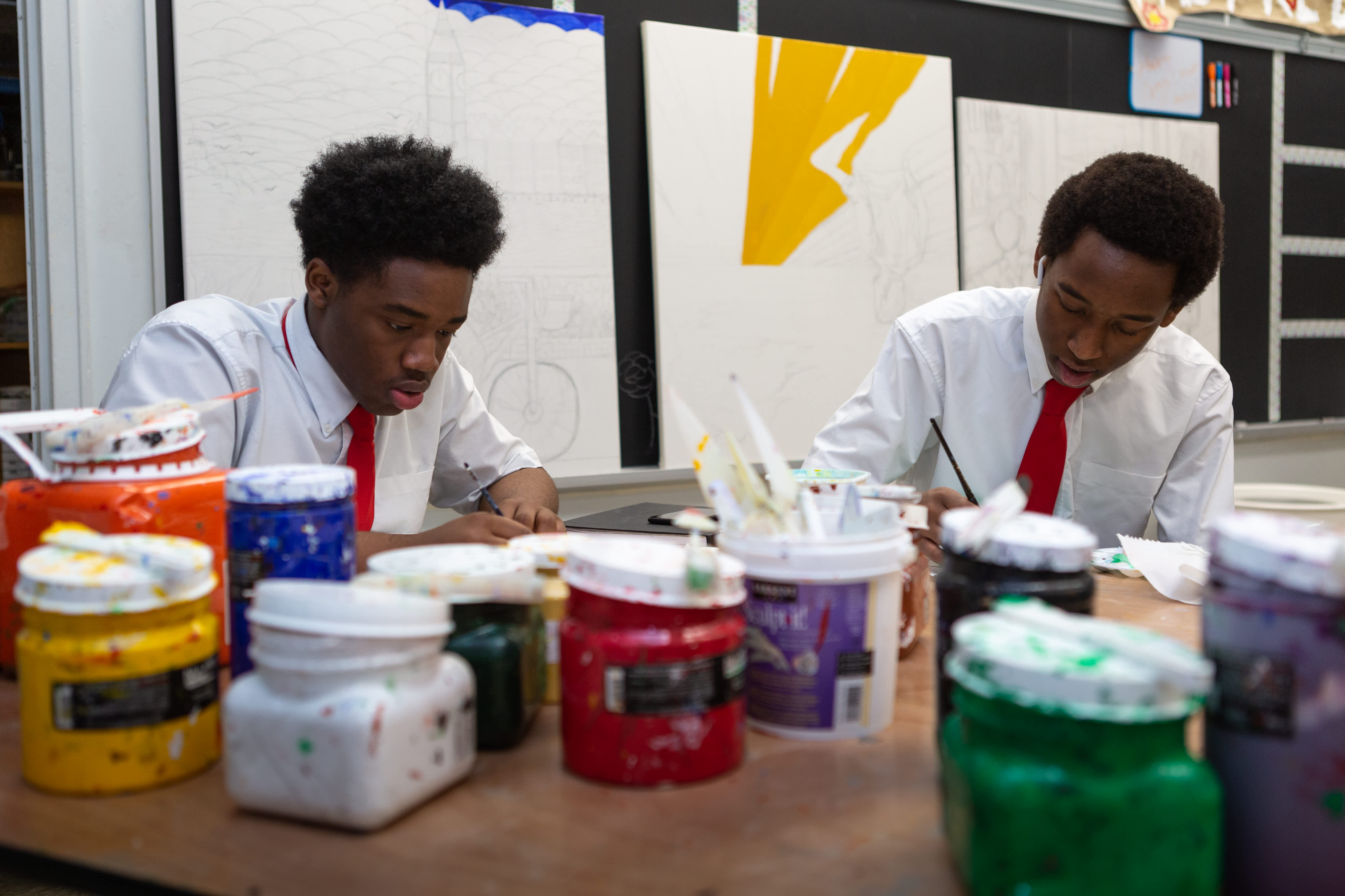 Students performing on stage.