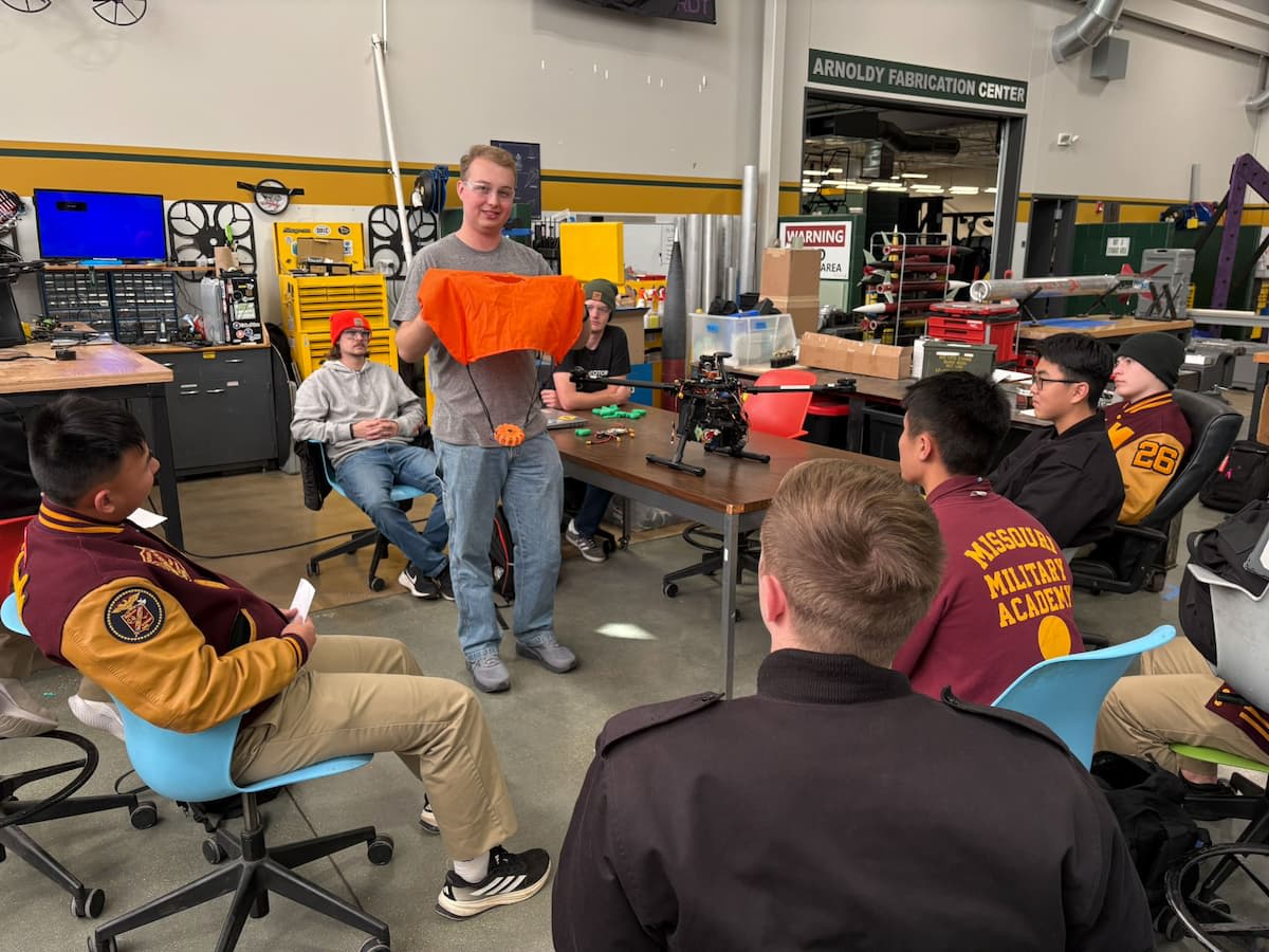 Missouri S&T engineering student demonstrates materials and design concepts to MMA cadets during a classroom session.