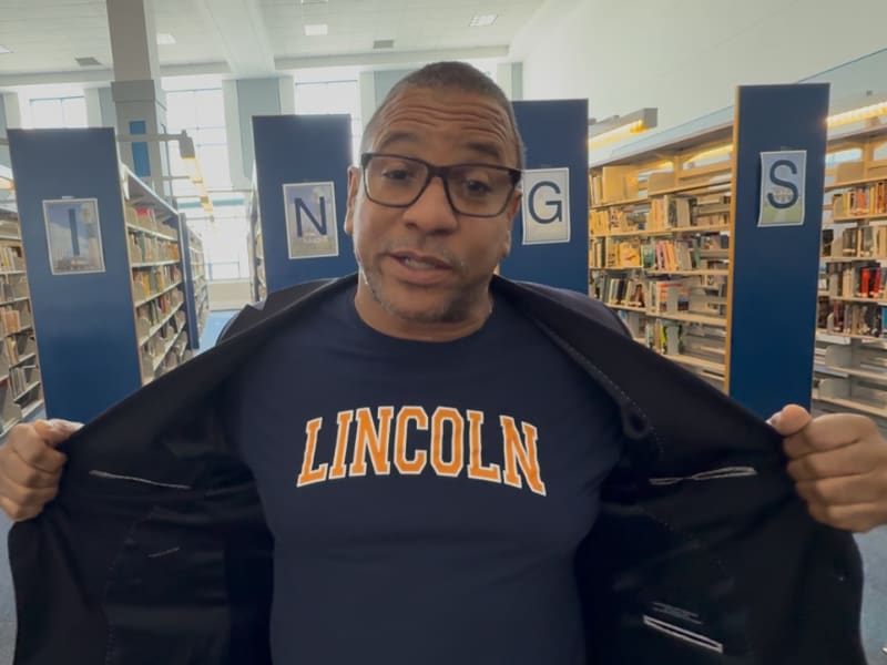 Donald Harris shows off Lincoln University T-Shirt at National Signing Day