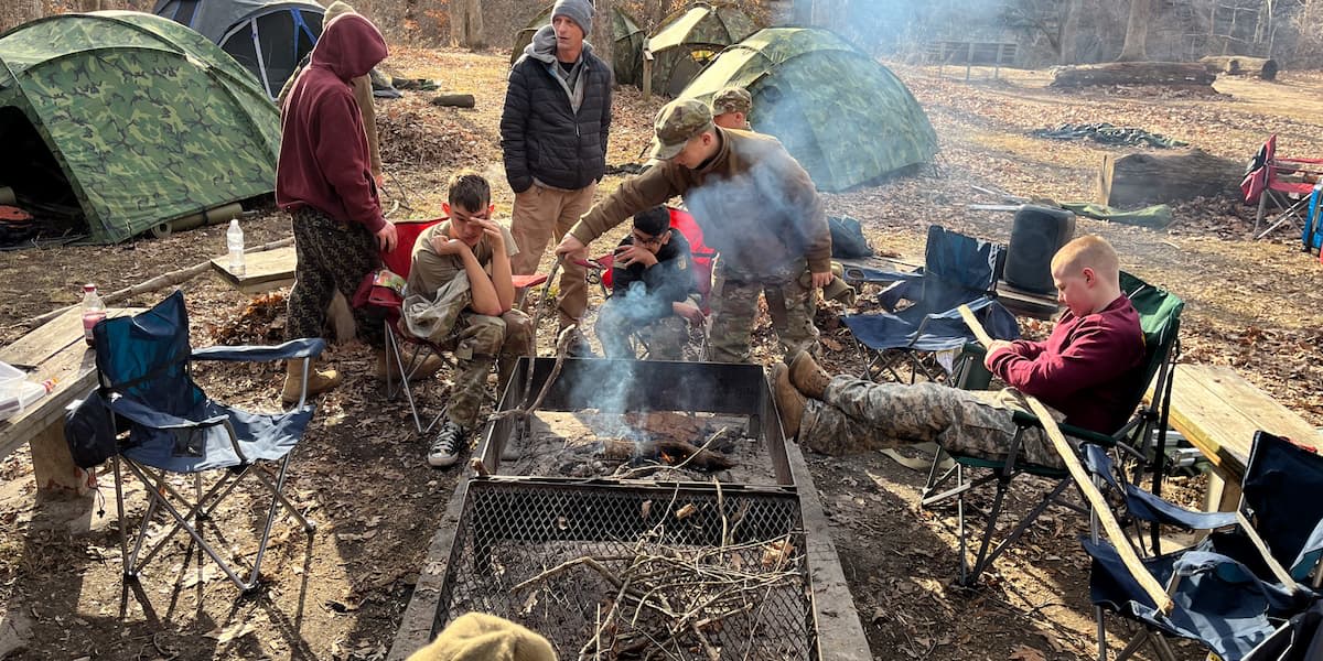 Scout Troop 1889 cadets gather at their campsite during the weekend campout at Pinnacles Youth Park.