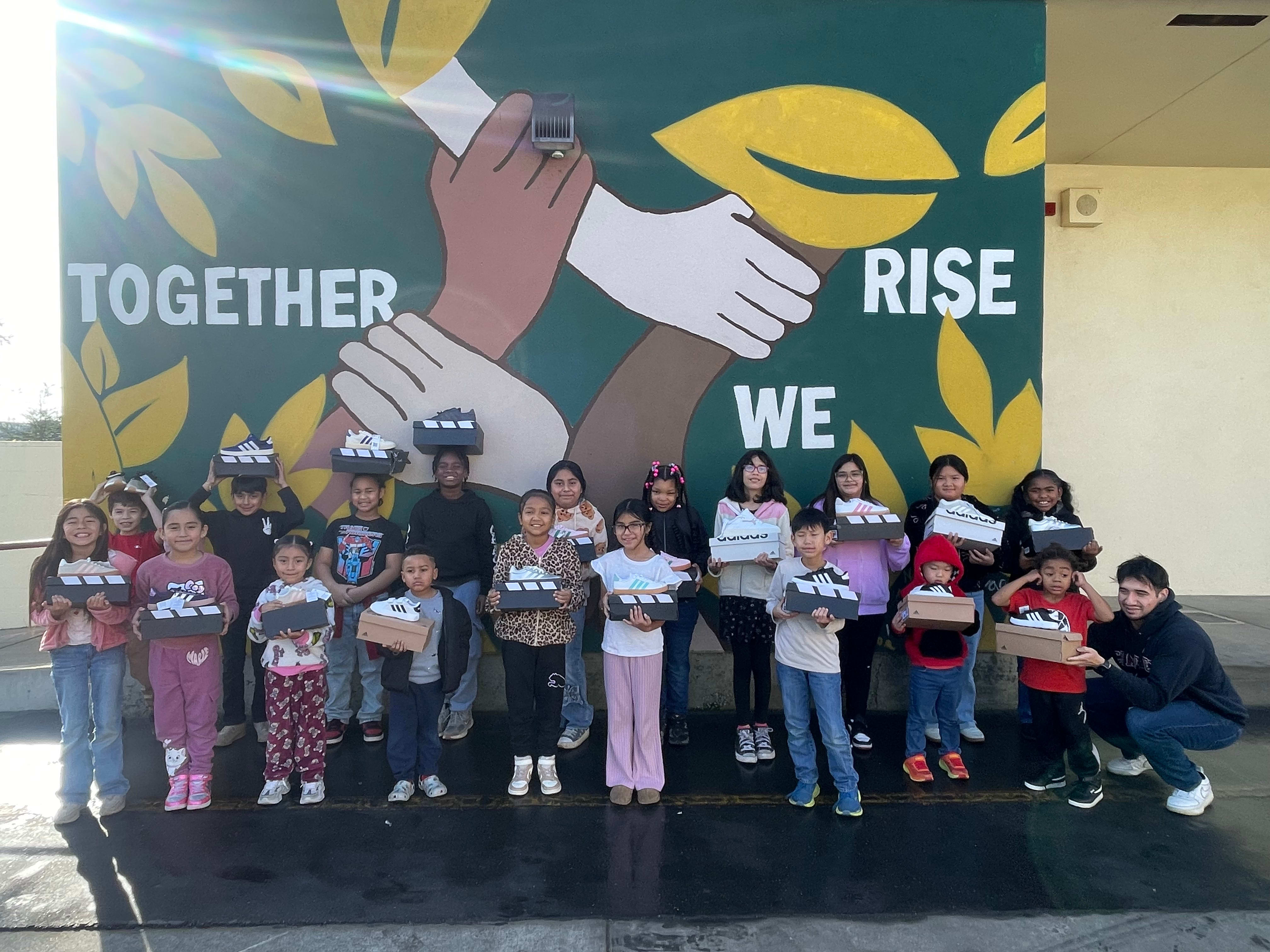 Mayfair students celebrating the Laced for Learning program
