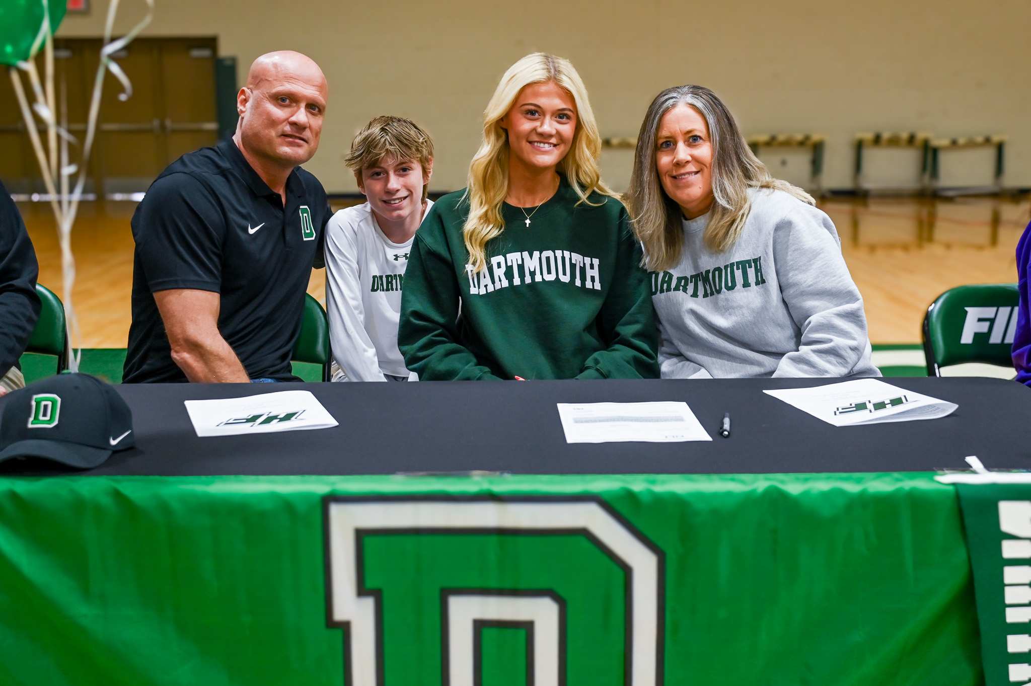 Holy Family senior Addy Cowan signs to play college hockey at Dartmouth College with her family.