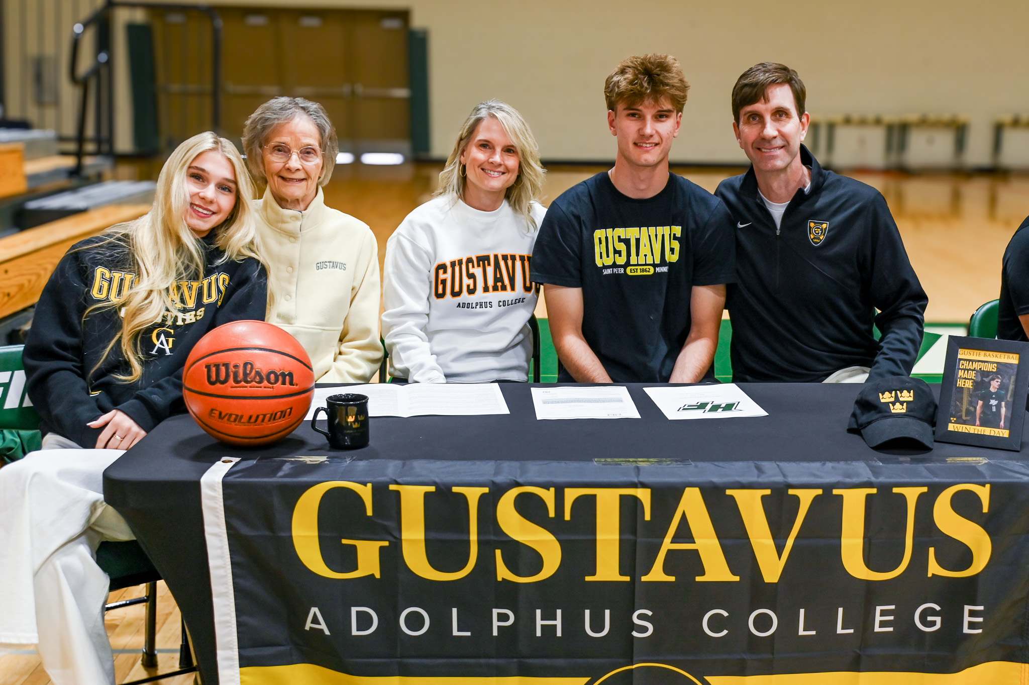 Holy Family senior Andrew Coleman signs to play college basketball at Gustavus Adolphus College with his family.