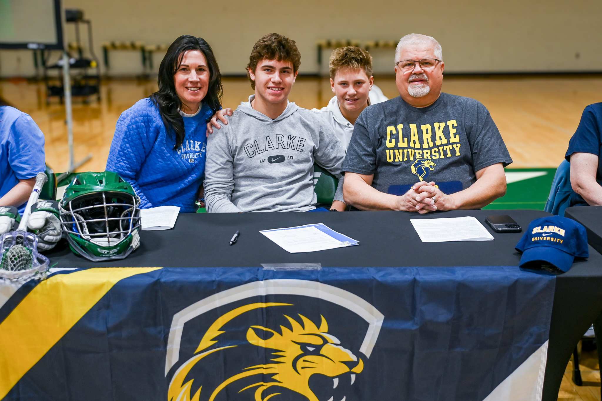Holy Family senior Bennet Pierce signs to play college lacrosse at Clarke University with his family.