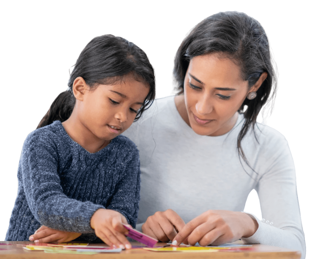 Teacher helping a student.