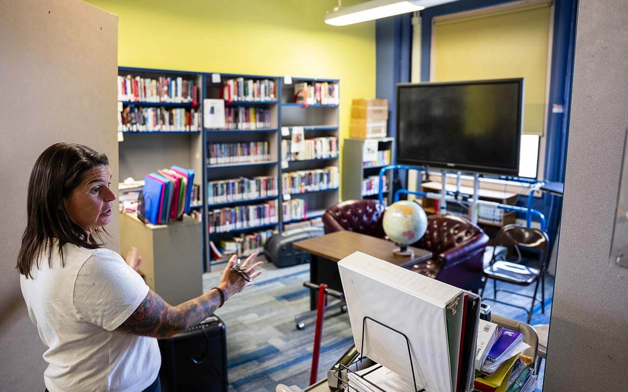 Principal Christine Lemon shows Alliance School’s former library, which was turned into a main office for the school.