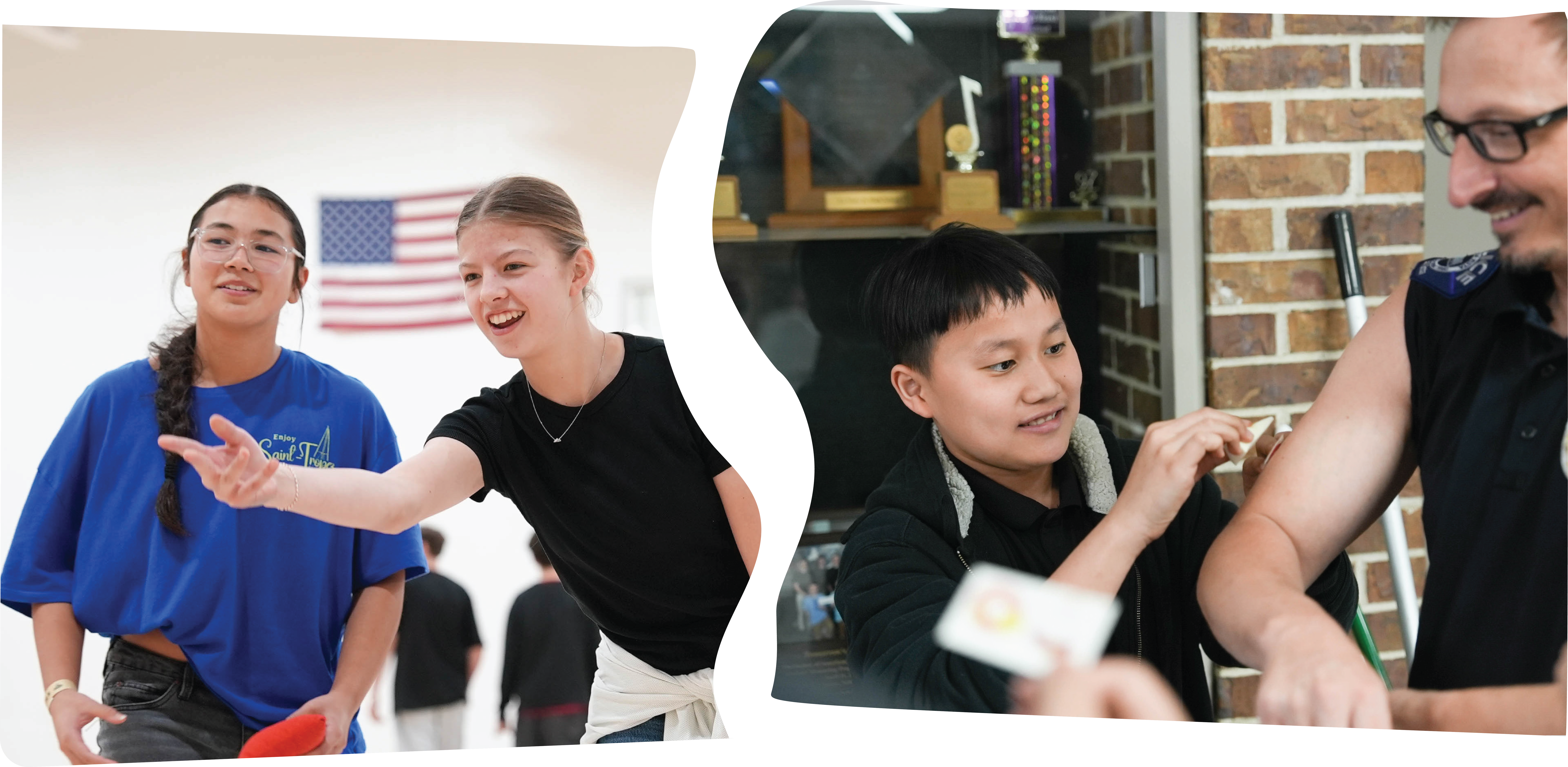 Students playing a game in front of an American flag while another student receives a temporary tattoo from an officer