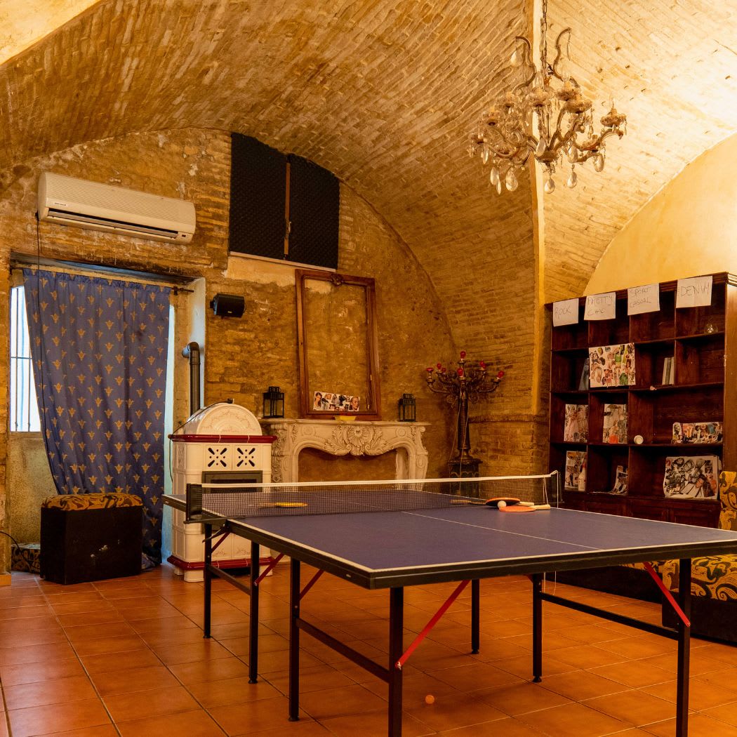 The vaulted student lounge at Allegria with a table tennis table