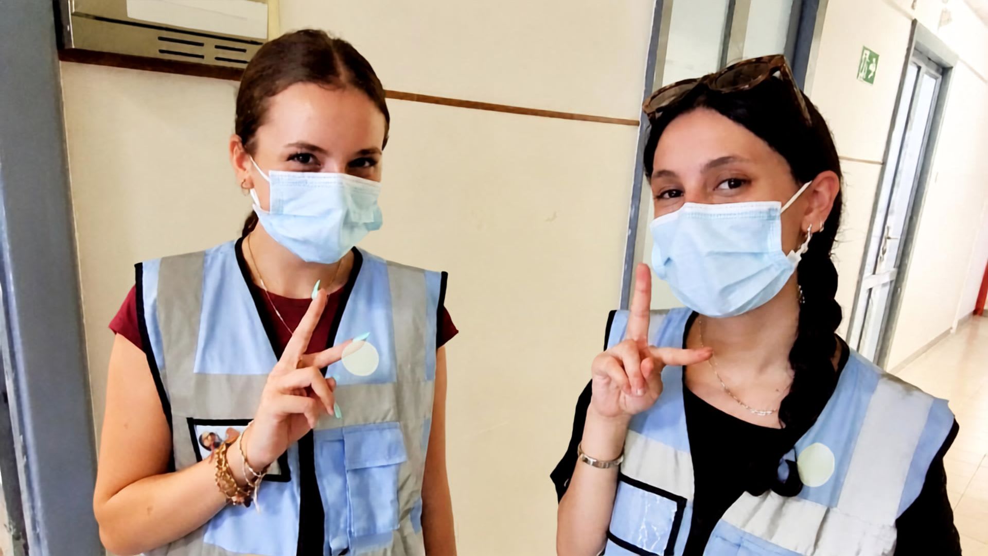 Two CCI students taking part in a community service activity