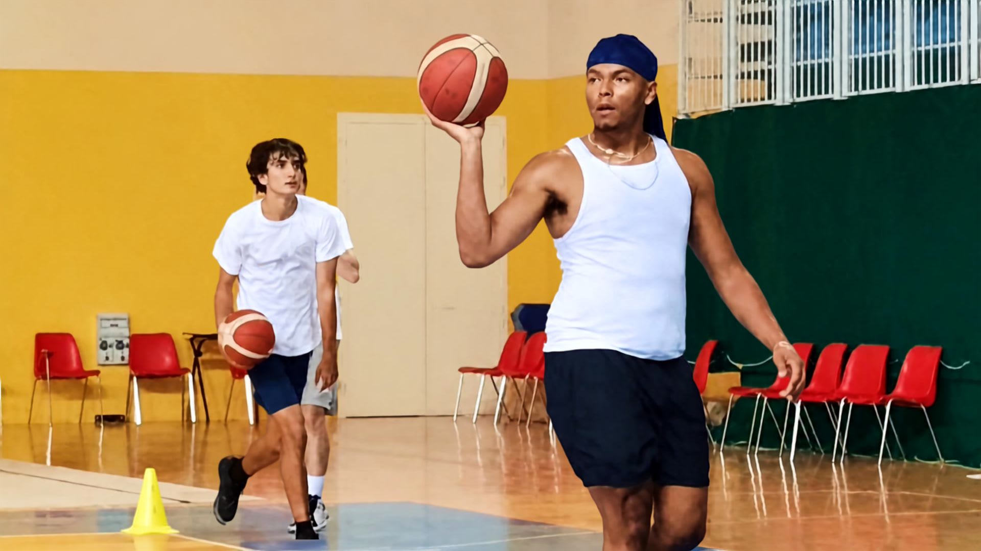 CCI students practising basketball in a local gymnasium