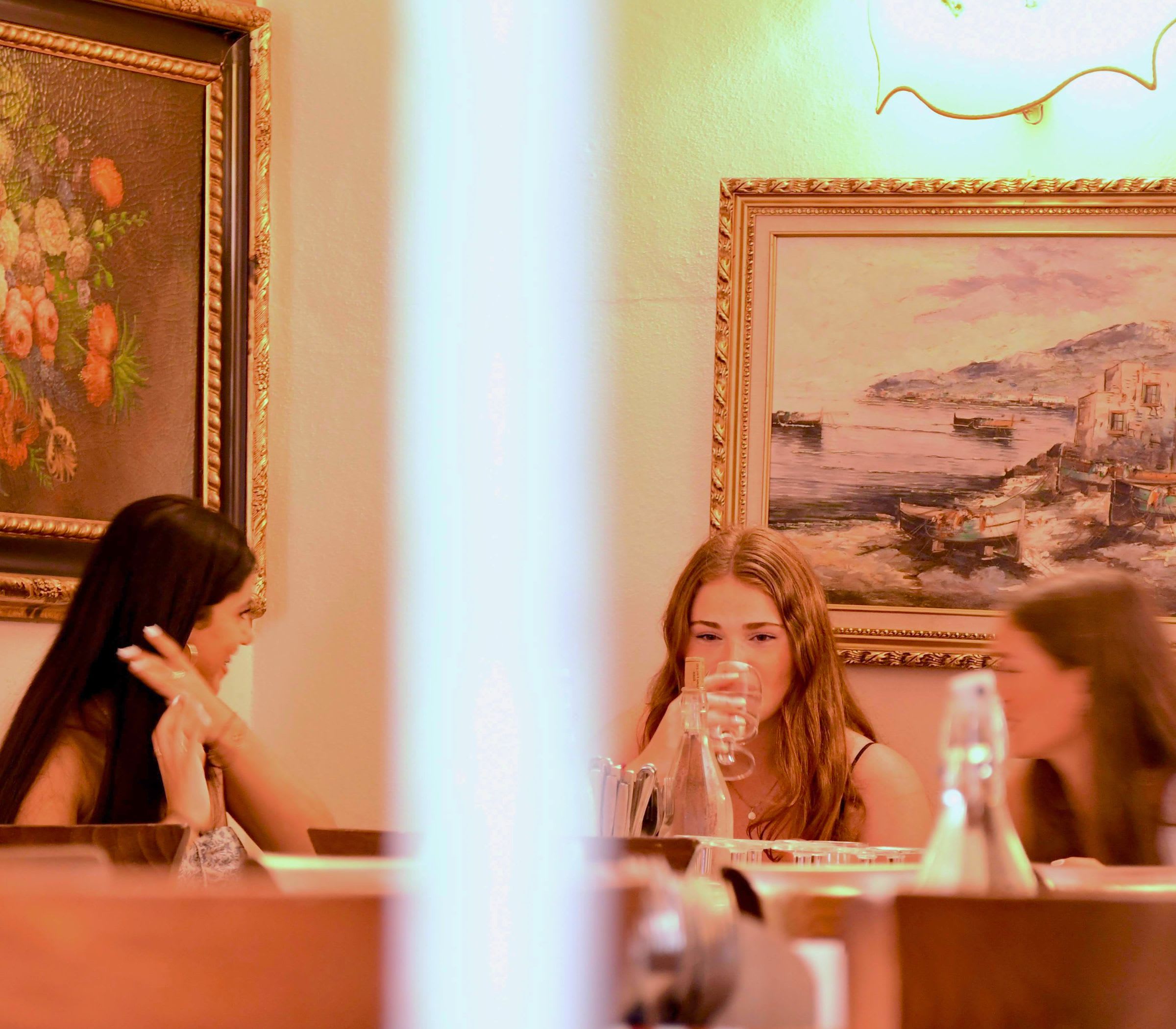 CCI students talking over dinner in Allegria's dining room